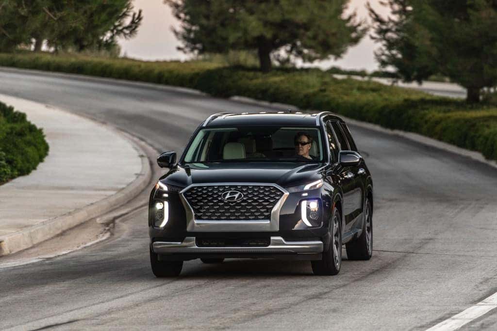 2022 Hyundai Palisade Caligraphy black mountain road