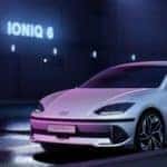 2023 Hyundai IONIQ 6 parked near IONIQ6 sign at night