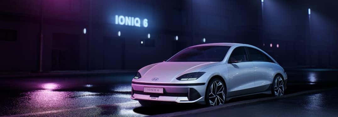 2023 Hyundai IONIQ6 parked near IONIQ6 sign at night