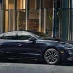 blue sonata on side of road