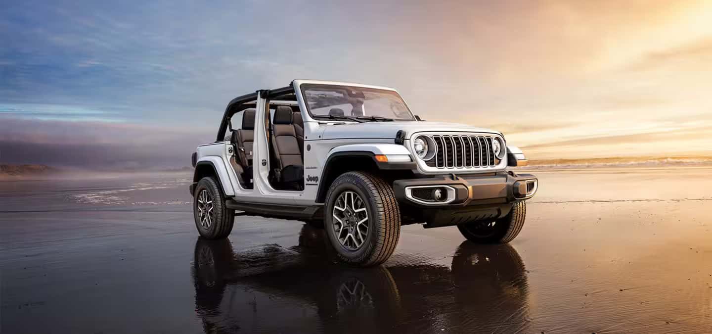 Mechanic performing maintenance service on a Jeep Wrangler
