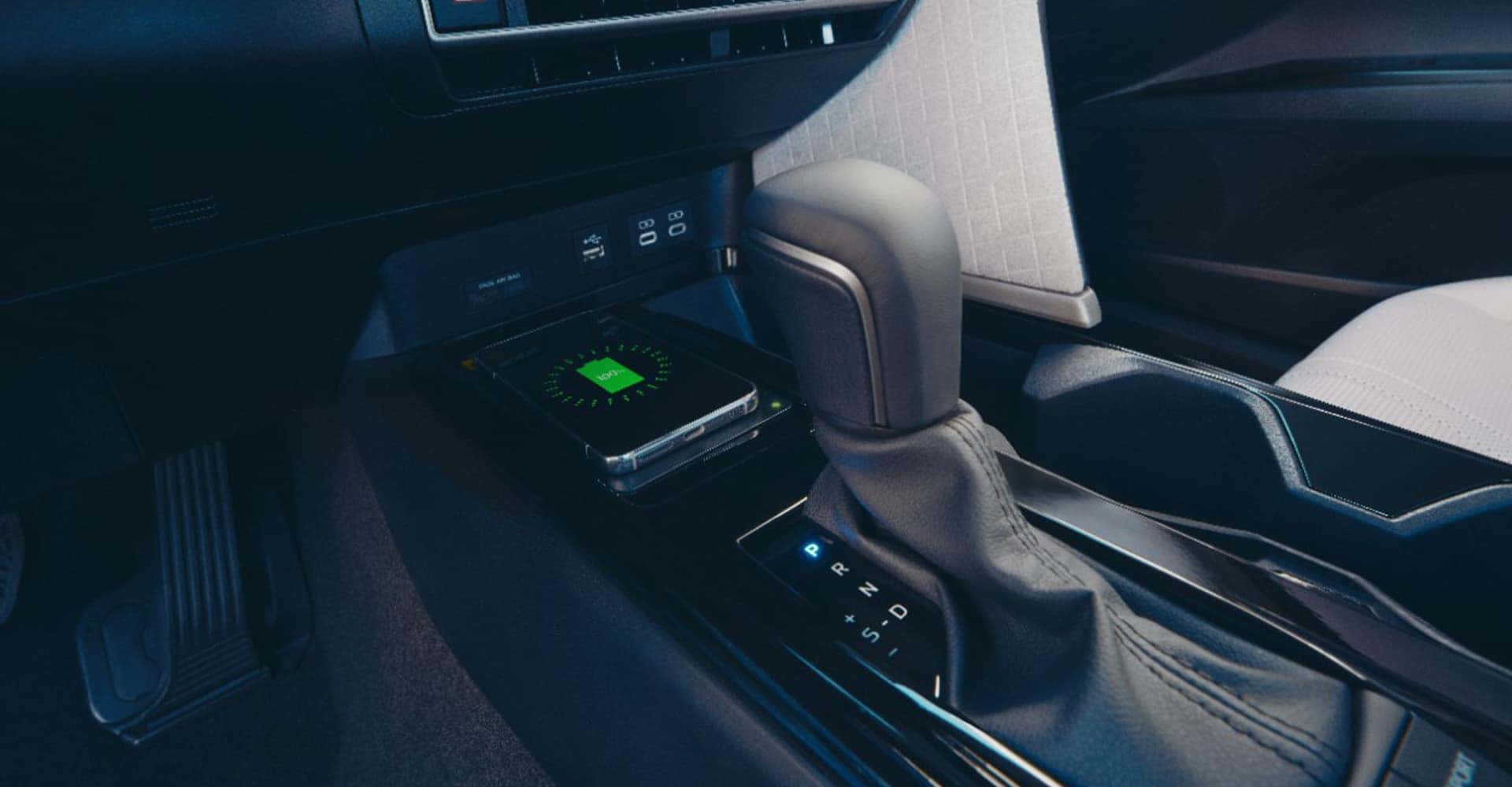Close up of Camry gearshift and wireless charging phone