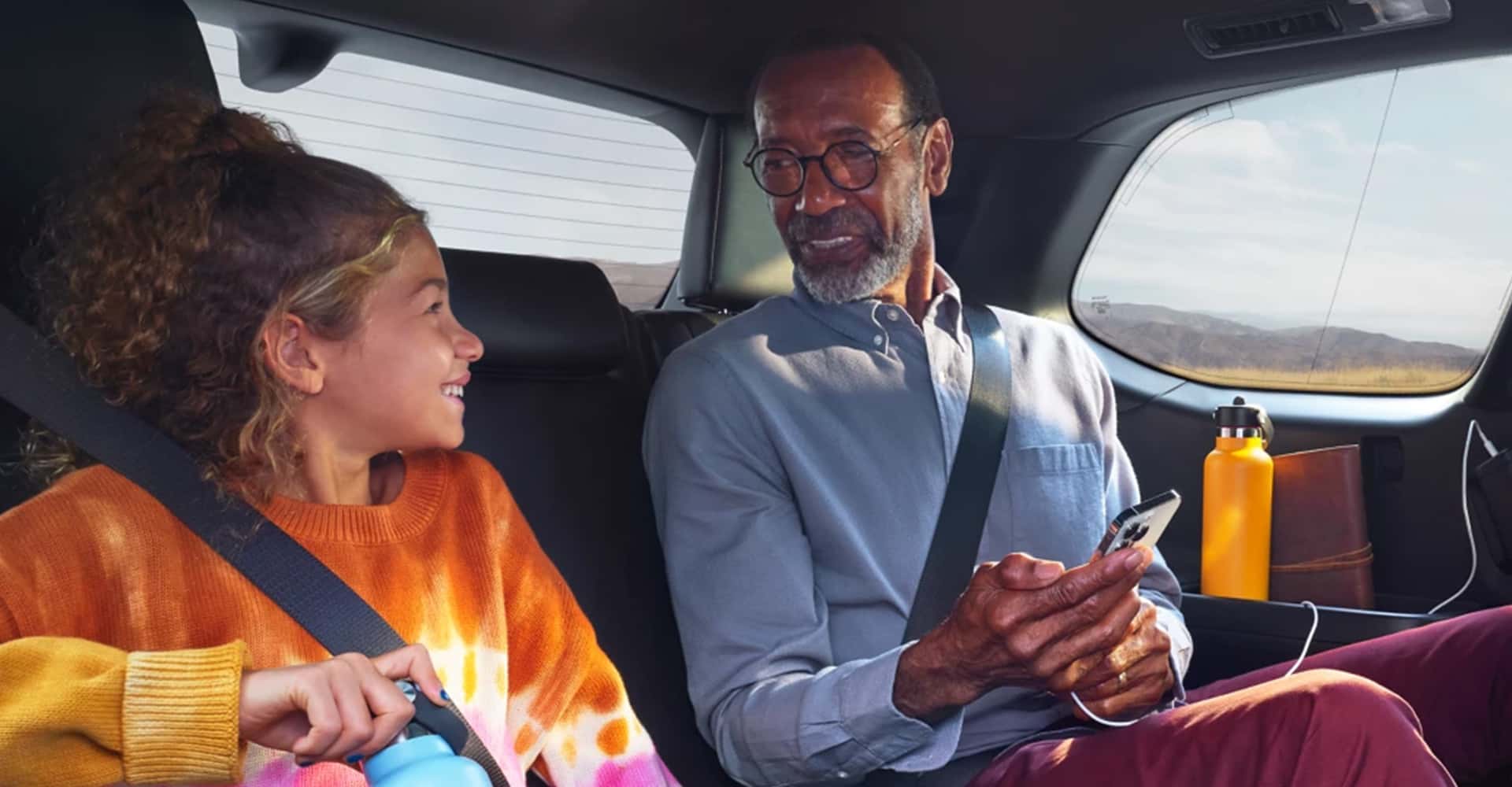 Interior shot of Grand Highlander 2025, father and daughter