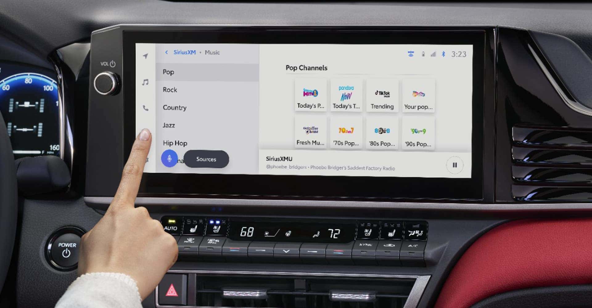 Someone interacting with camry touchscreen