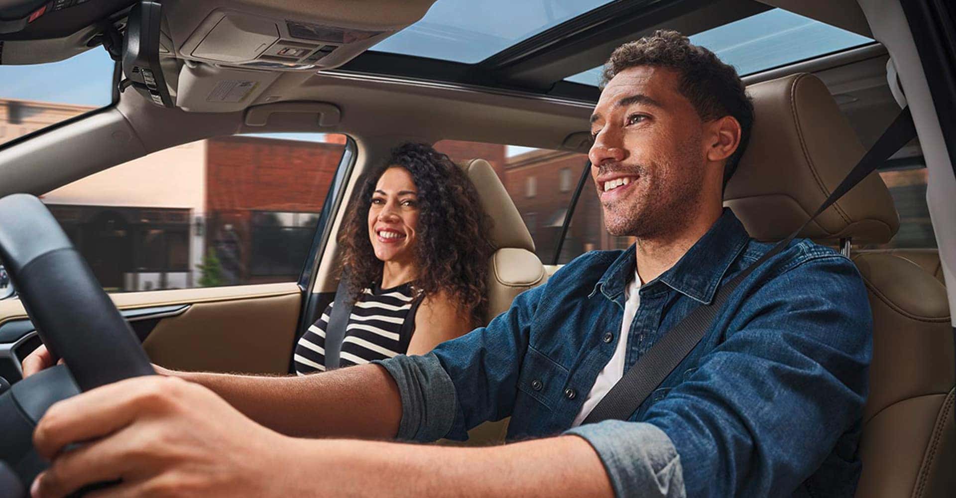 couple sitting in rav4