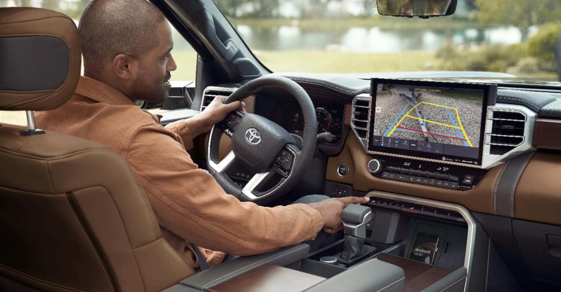 man interior driving tundra