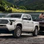 Couple unloading boat from their 2025 toyota tacoma