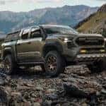 2026 Toyota Tacoma driving up rocks