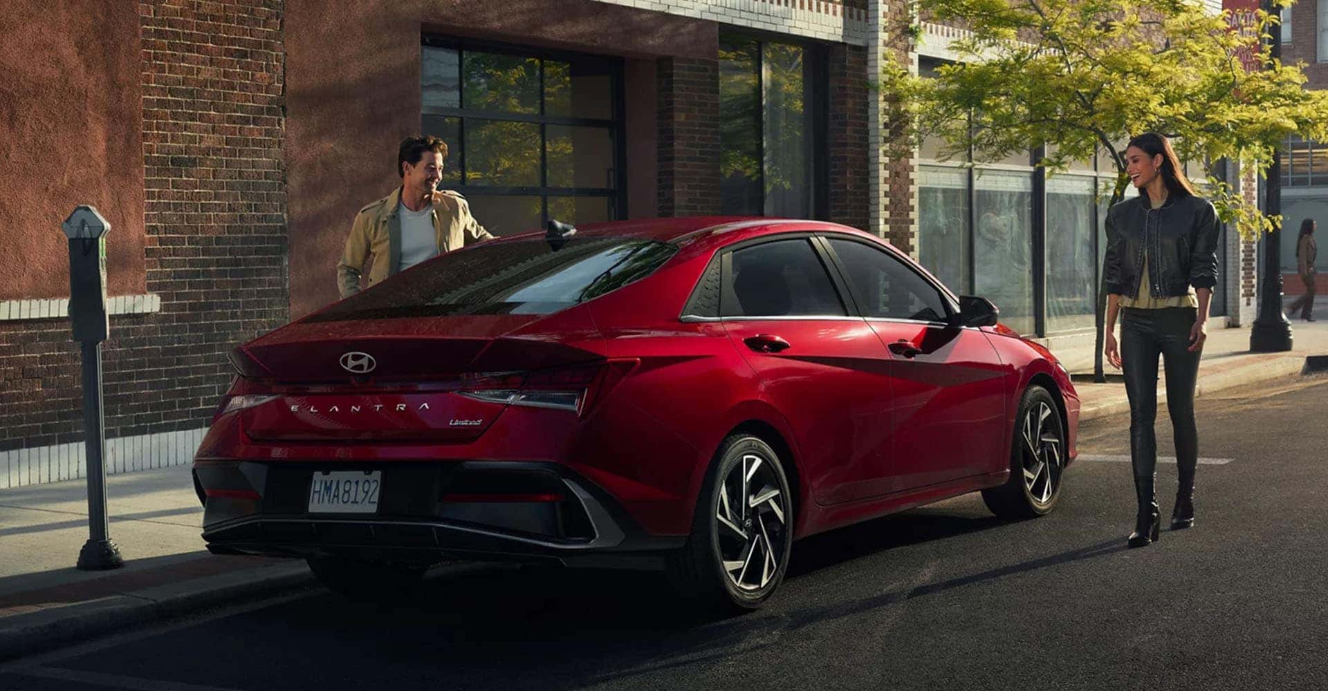Hyundai Elantra walking toward car